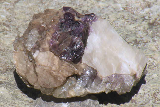 Purple & clear fluorite on calcite